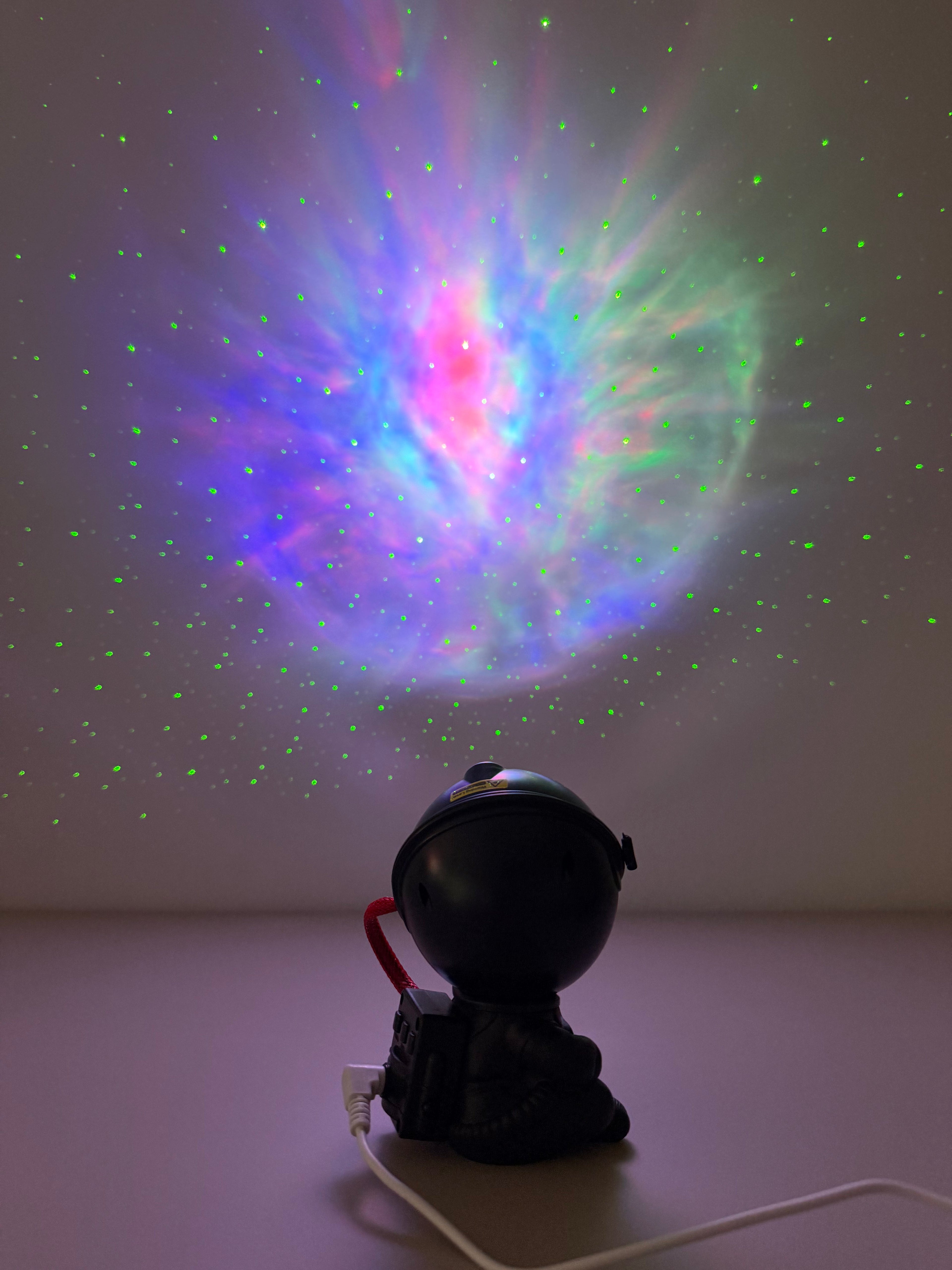 Cosmo Guard - Schwarze Actionfigur mit Kosmos-Projektion